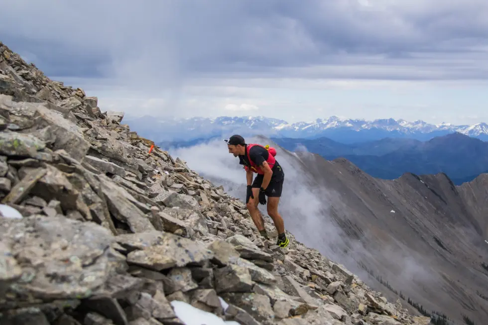 Damien Humbert climbing rocky mountain trail at Canada's SPRY Minotaur Skyrace 2022