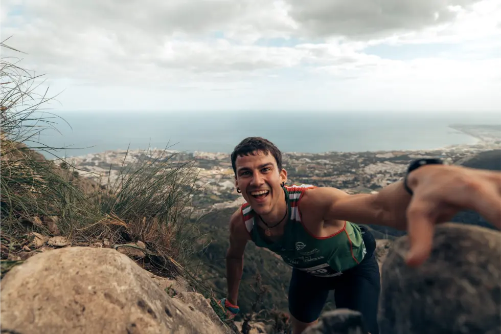 Male athlete smiling at the camera