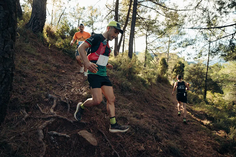 A runner running down mountain