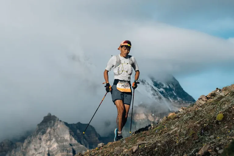 Yading skyrace athlete climbing mountain